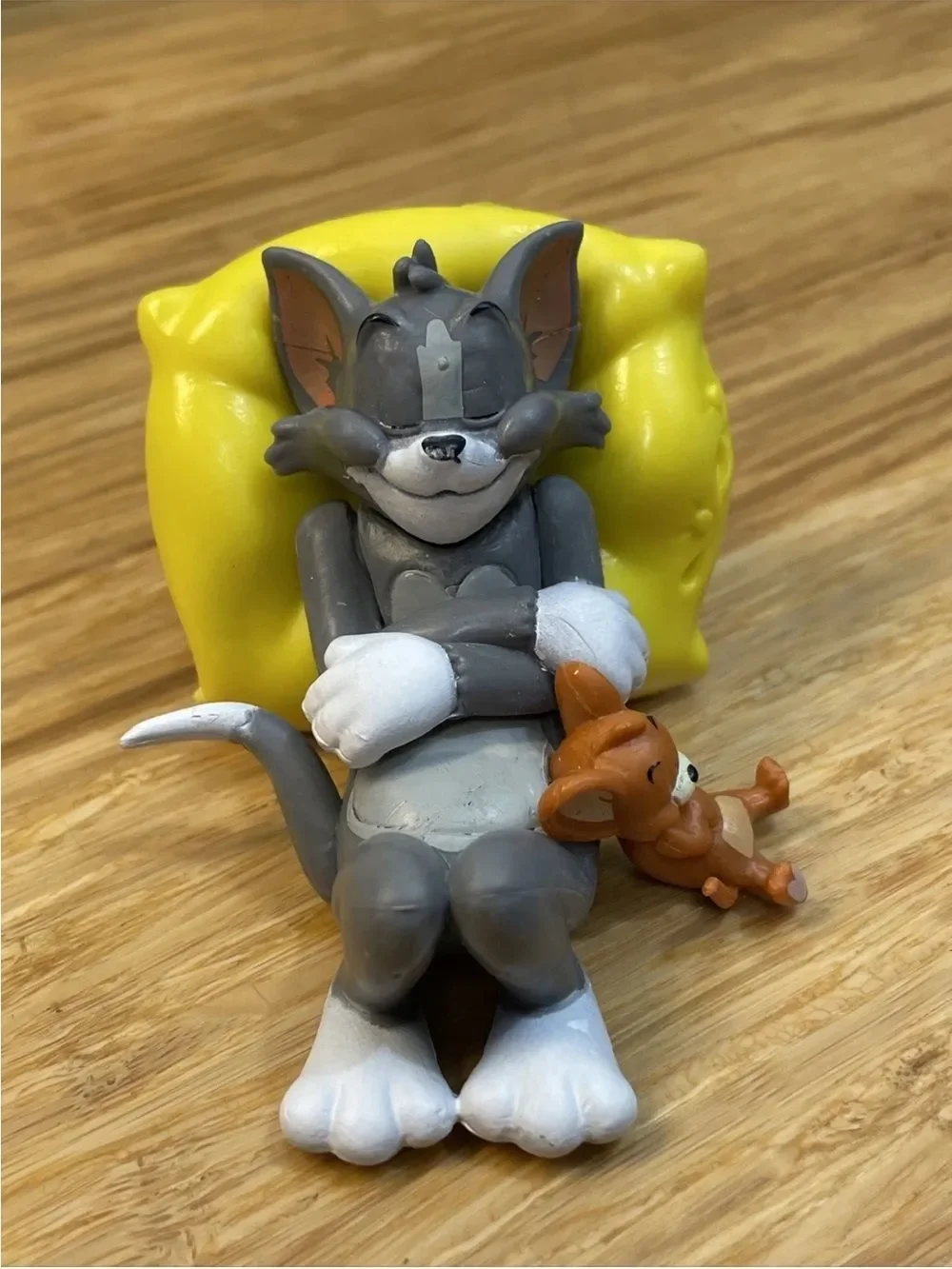 Warner Bros. Gray Tom & Brown Jerry with Yellow Cheese Bed Figurine